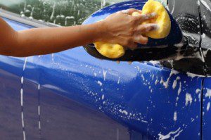 "Outdoor Blue Car Wash With Yellow Sponge" by samuiblue FreeDigitalPhotos.net